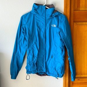 Women’s turquoise North Face rain jacket
